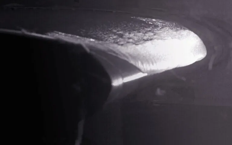 Oblique view of ice accretion on NACA0012 airfoil