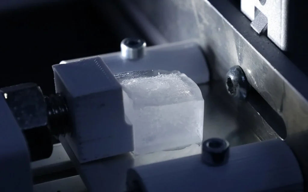 Ice cube pusher test closeup